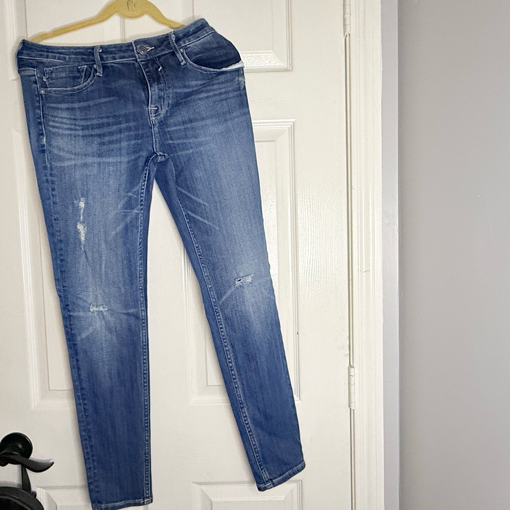 Blue Skinny Jeans With Distressing And Medium Wash